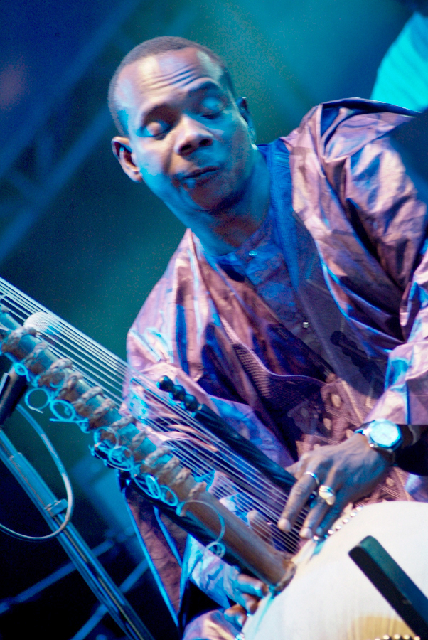 Touman's Diabate's Symmetric Orchestra, Lloyd Godman