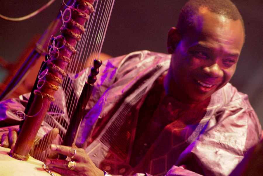 Touman's Diabate's Symmetric Orchestra, Lloyd Godman